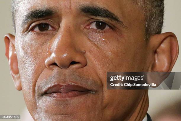 With tears running down his cheeks, U.S. President Barack Obama talks about the victims of the 2012 Sandy Hook Elementary School shooting and about...