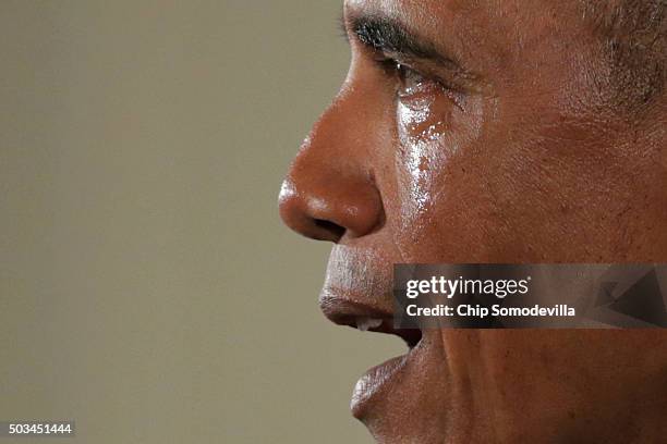 With tears running down his cheeks, U.S. President Barack Obama talks about the victims of the 2012 Sandy Hook Elementary School shooting and about...