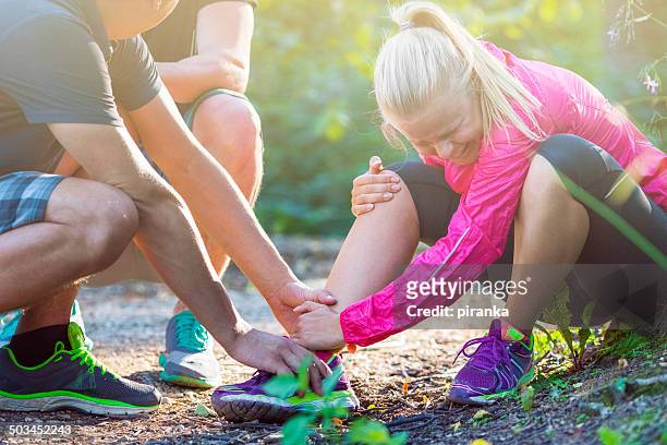 jogging injury - swollen ankles stock pictures, royalty-free photos & images