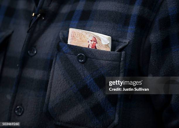 Ammon Bundy, the leader of an anti-government militia, carries a copy of the U.S. Constitution in his pocket as he speaks to members of the media in...