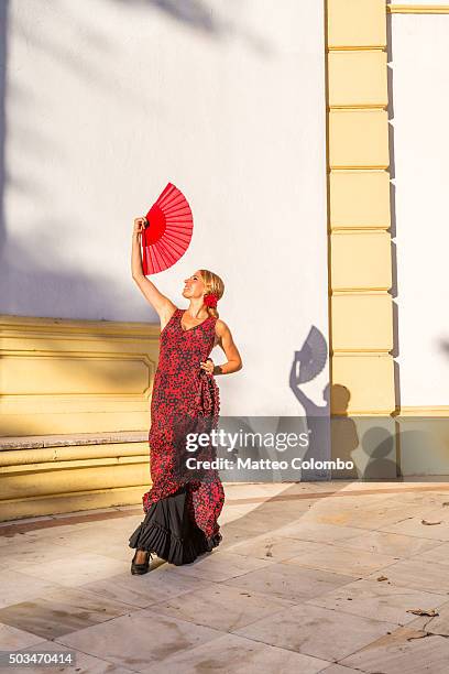 flamenco dancer performing outdoors in seville, andalusia, spain - seville dancing stock pictures, royalty-free photos & images