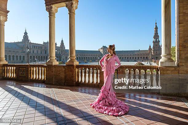 flamenco dancer performing in plaza de espana, seville, andalusia, spain - dress fotografías e imágenes de stock