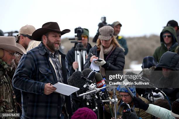 Ammon Bundy, the leader of an anti-government militia, speaks to members of the media in front of the Malheur National Wildlife Refuge Headquarters...