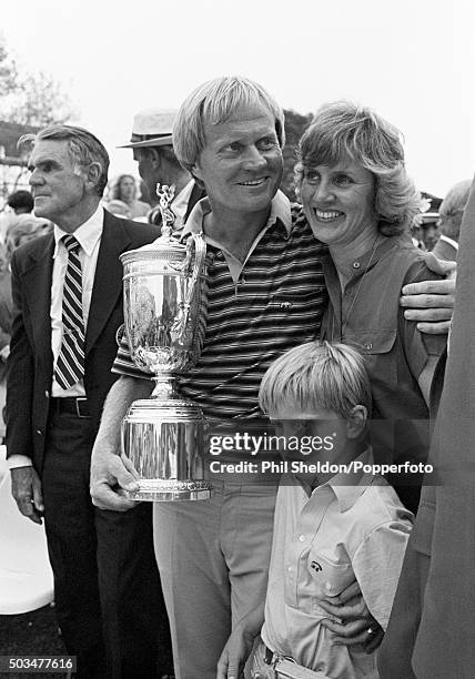 Jack Nicklaus of the United States holding the trophy, with his wife Barbara and son Michael, after winning the US Open Golf Championship held at the...
