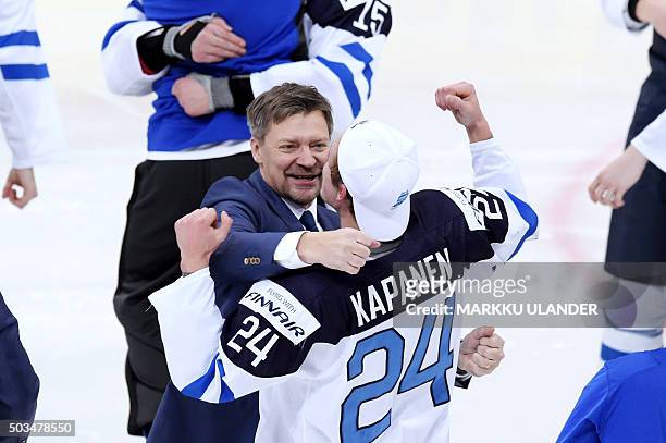 Finland's head coach Jukka Jalonen and Kasperi Kapanen of Finland celebrate after winning the 2016 IIHF World Junior Ice Hockey Championship final...