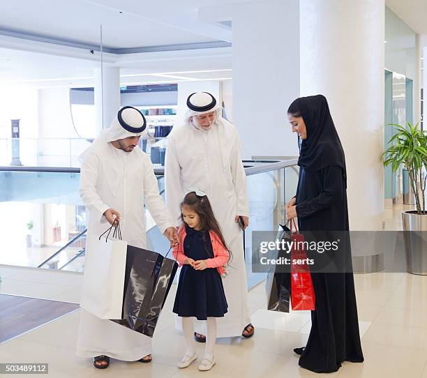 arab people meeting at shopping mall - grandfather arab stock pictures, royalty-free photos & images