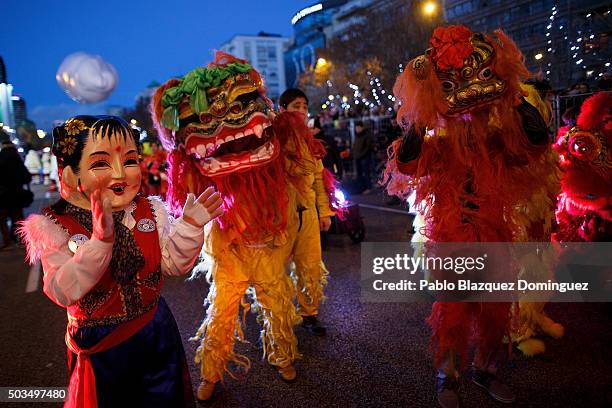 Performers dance during the 'Cabalgata de Reyes,' or the Three Kings parade on January 5, 2016 in Madrid, Spain. The traditional parade takes place...