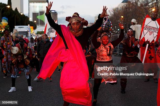 Performers dance as they wait for the start of the 'Cabalgata de Reyes,' or the Three Kings parade on January 5, 2016 in Madrid, Spain. The...