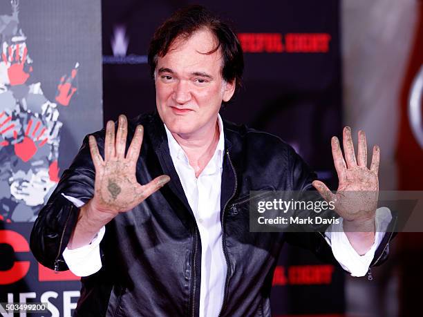 Quentin Tarantino Immortalized With Hand And Footprint Ceremony at TCL Chinese Theatre on January 5, 2016 in Hollywood, California.