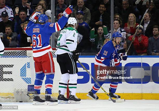 Derek Stepan of the New York Rangers celebrates his goal at 1:56 of the first period against the Dallas Stars at Madison Square Garden on January 5,...