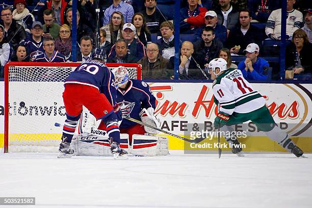 Zach Parise of the Minnesota Wild beats Anton Forsberg of the Columbus Blue Jackets for a goal during the second period on January 5, 2016 at...