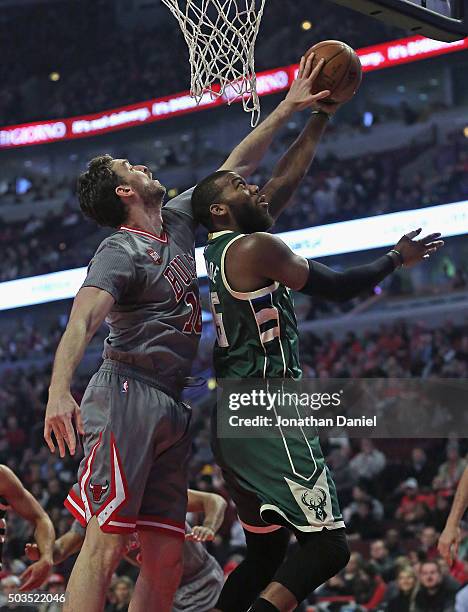 Pau Gasol of the Chicago Bulls blocks a shot by Greg Monroe of the Milwaukee Bucks at the United Center on January 5, 2016 in Chicago, Illinois. NOTE...