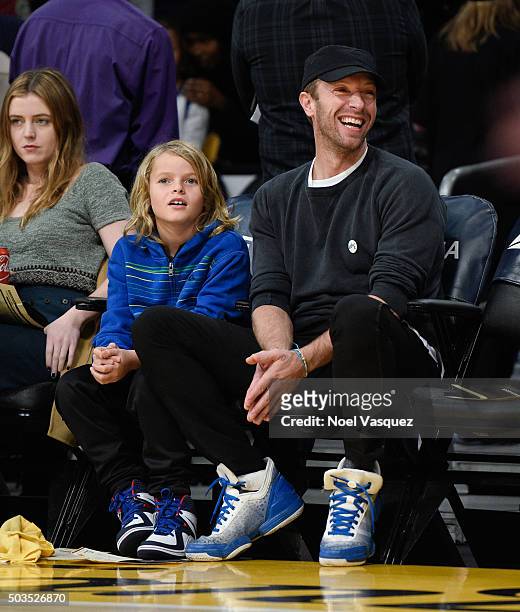 Moses Martin and Chris Martin attend a basketball game between the Golden State Warriors and the Los Angeles Lakers at Staples Center on January 5,...