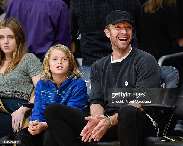 Moses Martin and Chris Martin attend a basketball game between the Golden State Warriors and the Los Angeles Lakers at Staples Center on January 5,...