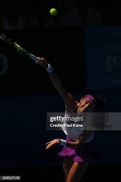 Caroline Garcia of France serves to Sabine Lisicki of Germany in the womens singles match during day four of the 2016 Hopman Cup at Perth Arena on...