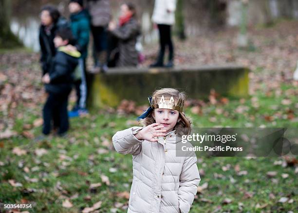 Child enjoys during the Cabalgata Los Reyes Magos the day before Epiphany, in Pamplona.
