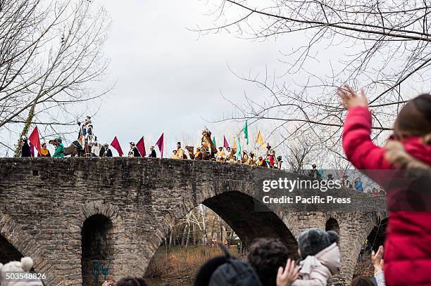 The Cabalgata Los Reyes Magos cross the Magdalena bridge over Arga River the day before Epiphany, in Pamplona.