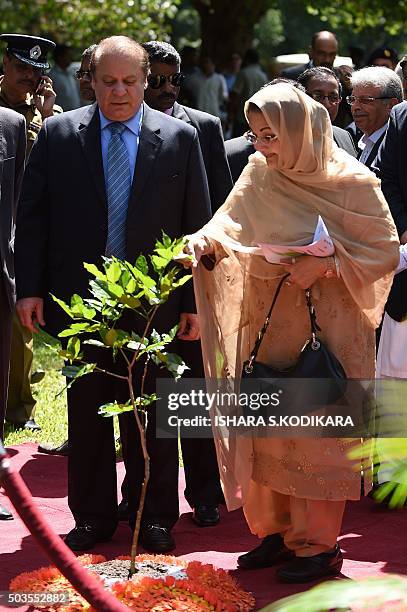 Pakistani Prime Minister Nawaz Sharif and his wife Kalsoom Nawaz Sharif plant a tree during a visit to The Peradeniya Royal Botanical Garden in Kandy...