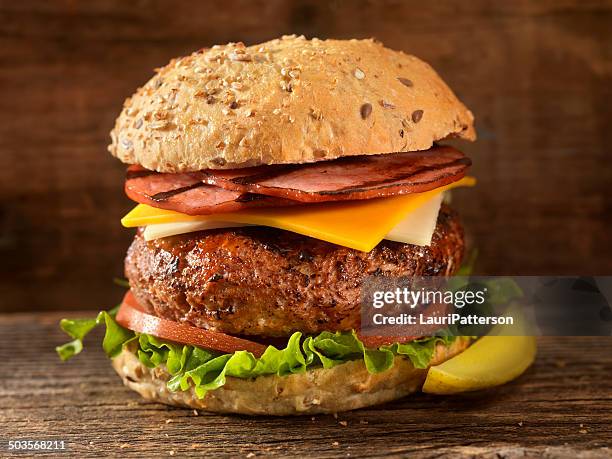 bacon cheeseburger - giant cheeseburger stock pictures, royalty-free photos & images