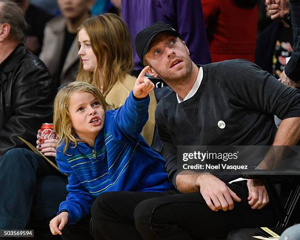 Moses Martin and Chris Martin attend a basketball game between the Golden State Warriors and the Los Angeles Lakers at Staples Center on January 5,...