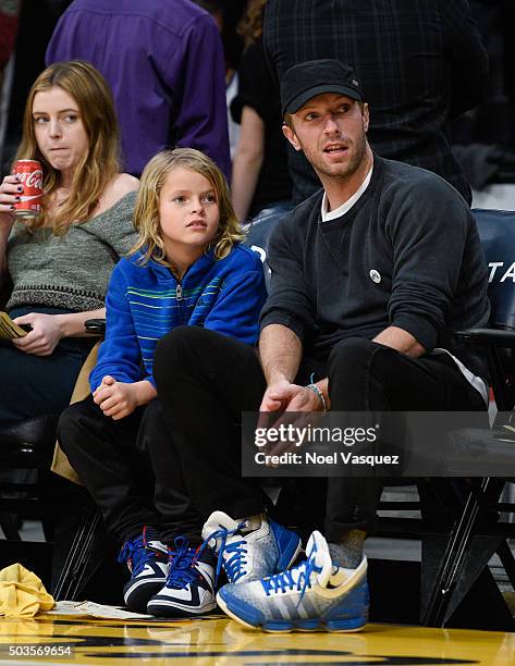 Chris Martin and Moses Martin attend a basketball game between the Golden State Warriors and the Los Angeles Lakers at Staples Center on January 5,...