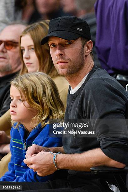 Chris Martin and Moses Martin attend a basketball game between the Golden State Warriors and the Los Angeles Lakers at Staples Center on January 5,...