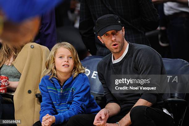 Chris Martin and Moses Martin attend a basketball game between the Golden State Warriors and the Los Angeles Lakers at Staples Center on January 5,...