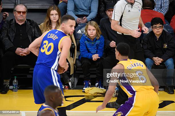 Jack Nicholson, Lorraine Nicholson, Moses Martin and Chris Martin attend a basketball game between the Golden State Warriors and the Los Angeles...