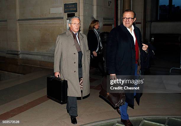 Franco-American art dealer Guy Wildenstein arrives at the Paris courthouse with his lawyer Herve Temime for the second day of his trial on January 6,...