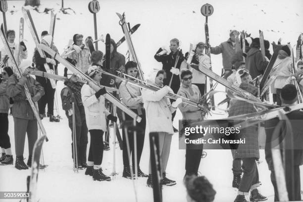 Denver University students taking beginners class in skiing.