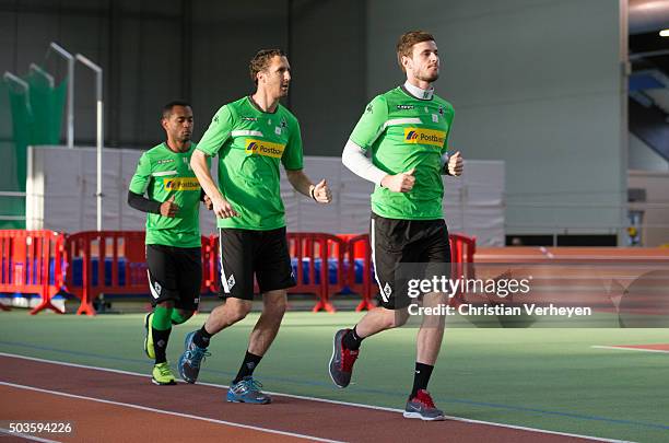 Havard Nordtveit, Roel Brouwers and Raffael of Borussia Moenchengladbach run during the lactate test of Borussia Moenchengladbach at Esprit Arena on...