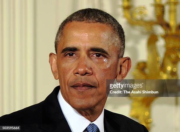President Barack Obama sheds tears as talks about the victims of the 2012 Sandy Hook Elementary School shooting and about his efforts to increase...