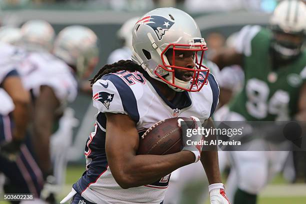 Wide Receiver Keshawn Martin of the New England Patriots has a long gain against the New York Jets at MetLife Stadium on December 27, 2015 in East...