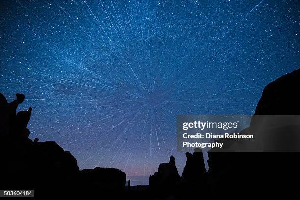 warp speed stars at park avenue section of arches national park, moab, utah - stars sky stock-fotos und bilder