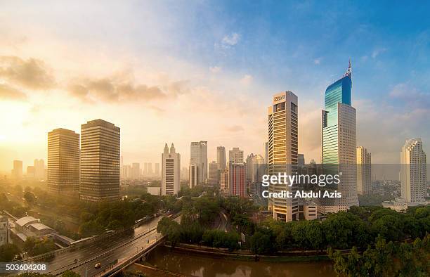 jakarta first sunrise in 2016 - indonesia stock pictures, royalty-free photos & images
