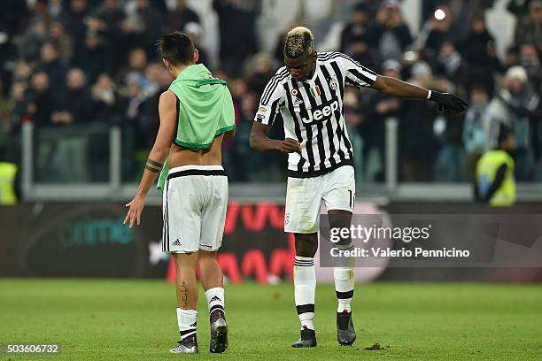 Paul Pogba and Paulo Dybala of Juventus FC celebrate victory at the end of the Serie A match between Juventus FC and Hellas Verona FC at Juventus...