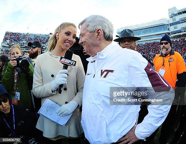 Head Coach Frank Beamer of the Virginia Tech Hokies is interviewed by Olivia Harlan after the game against the North Carolina Tar Heels on November...