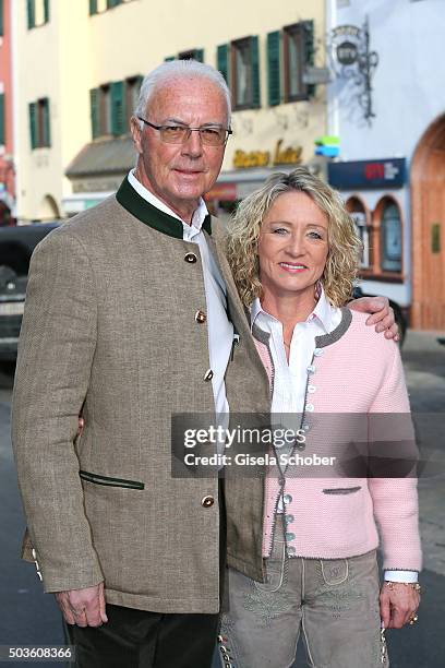 Franz Beckenbauer and his wife Heidi Beckenbauer, wearing traditional leather trousers, pose during the Neujahrs-Karpfenessen at Hotel zur Tenne on...