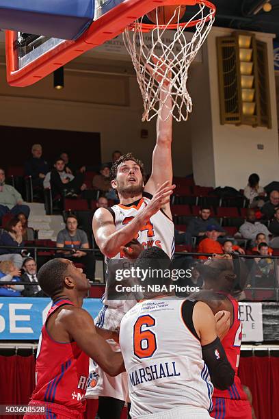 Jordan Bachynski of the Westchester Knicks shoots the ball against the Grand Rapids Drive at the Westchester County Center on December 10, 2015 in...