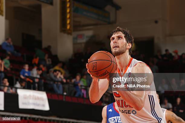 Jordan Bachynski of the Westchester Knicks shoots a foul shot against the Delaware 87ers at the Westchester County Center on December 12, 2015 in...