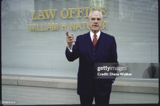 Rep. D-Ky. William H. Natcher, standing outside law office.