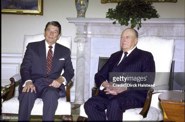 King V Olav of Norway meeting with President Ronald W. Reagan in Oval Office.