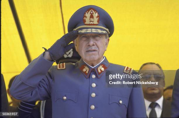 Chilean Leader, General Augusto Pinochet, in a close-up as he salutes.