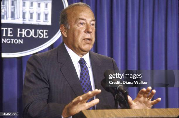 State Secy. George P. Shultz gestures during WH press conference regarding the US Pres. Ronald W. Reagan-Russian meeting.