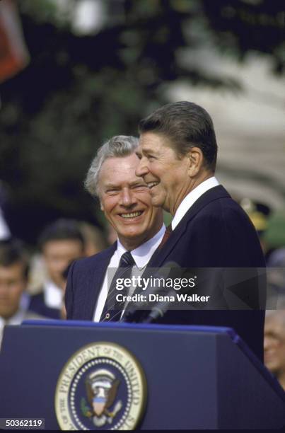 President Ronald W. Reagan and Prime Minister Poul Schluter of Denmark at a White House Ceremony.