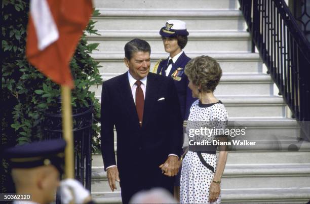 President Ronald W. Reagan [& Wife] during the visit of Prime Minister Poul Schluter of Denmark to the White House .