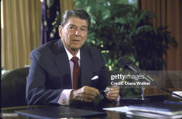 United States President Ronald W. Reagan as he announces his directive on South Africa in the Oval Office.