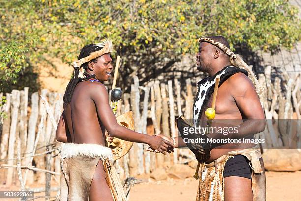 zulu men in kwazulu-natal, south africa - men in loincloths stock pictures, royalty-free photos & images
