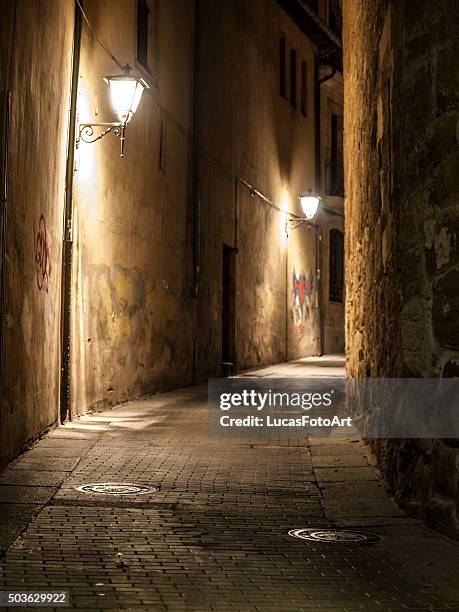 old street lamps illuminated by night - art antique ストックフォトと画像