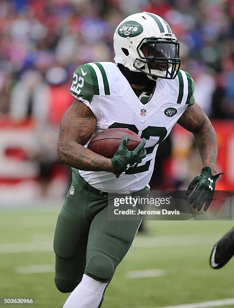 Stevan Ridley of the New York Jets runs for yards during the first half against the Buffalo Bills at Ralph Wilson Stadium on January 03, 2016 in...